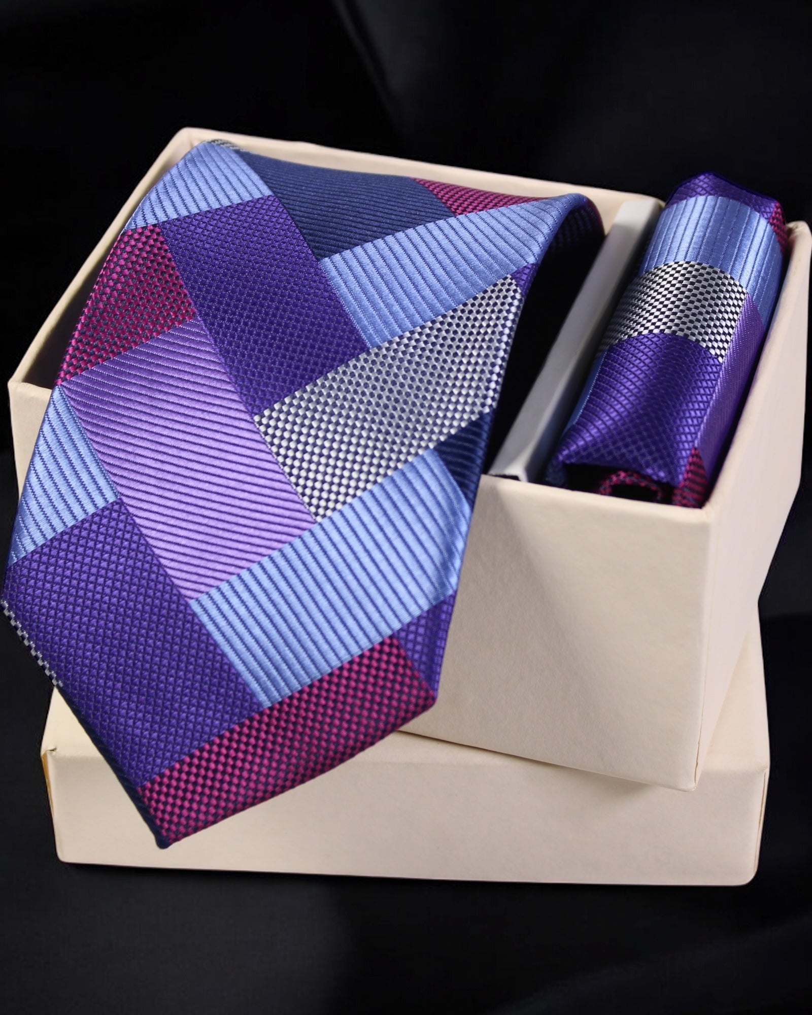 Colorful geometric-patterned tie and pocket square set in a box Tie Benon