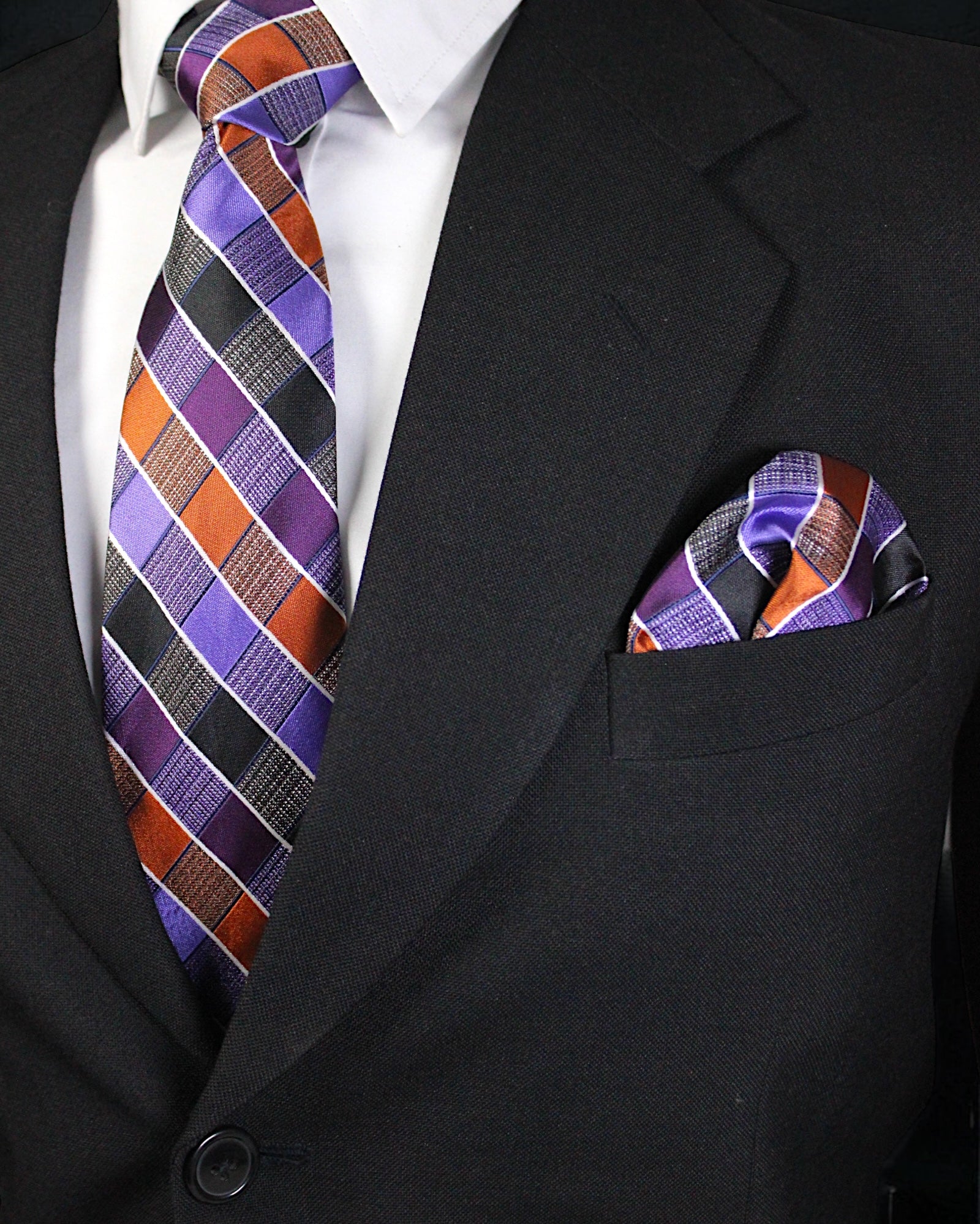 Black suit with a plaid tie and pocket square Tie Benon