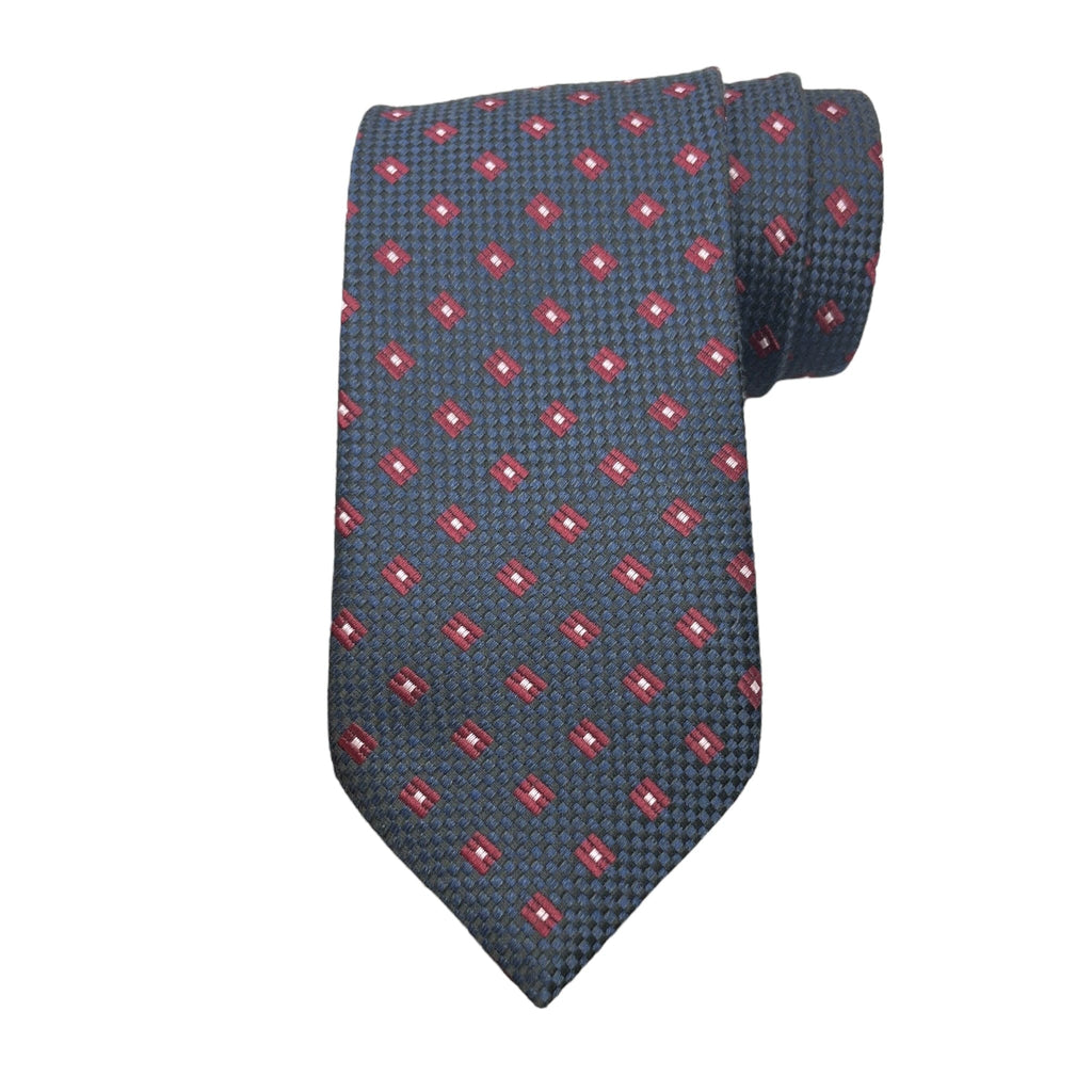 A blue classic woollen tie with a geometric pattern, displayed in a stacked arrangement.
