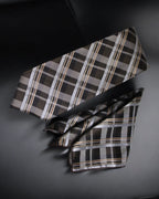 Plaid tie on a dark background tie Benon

