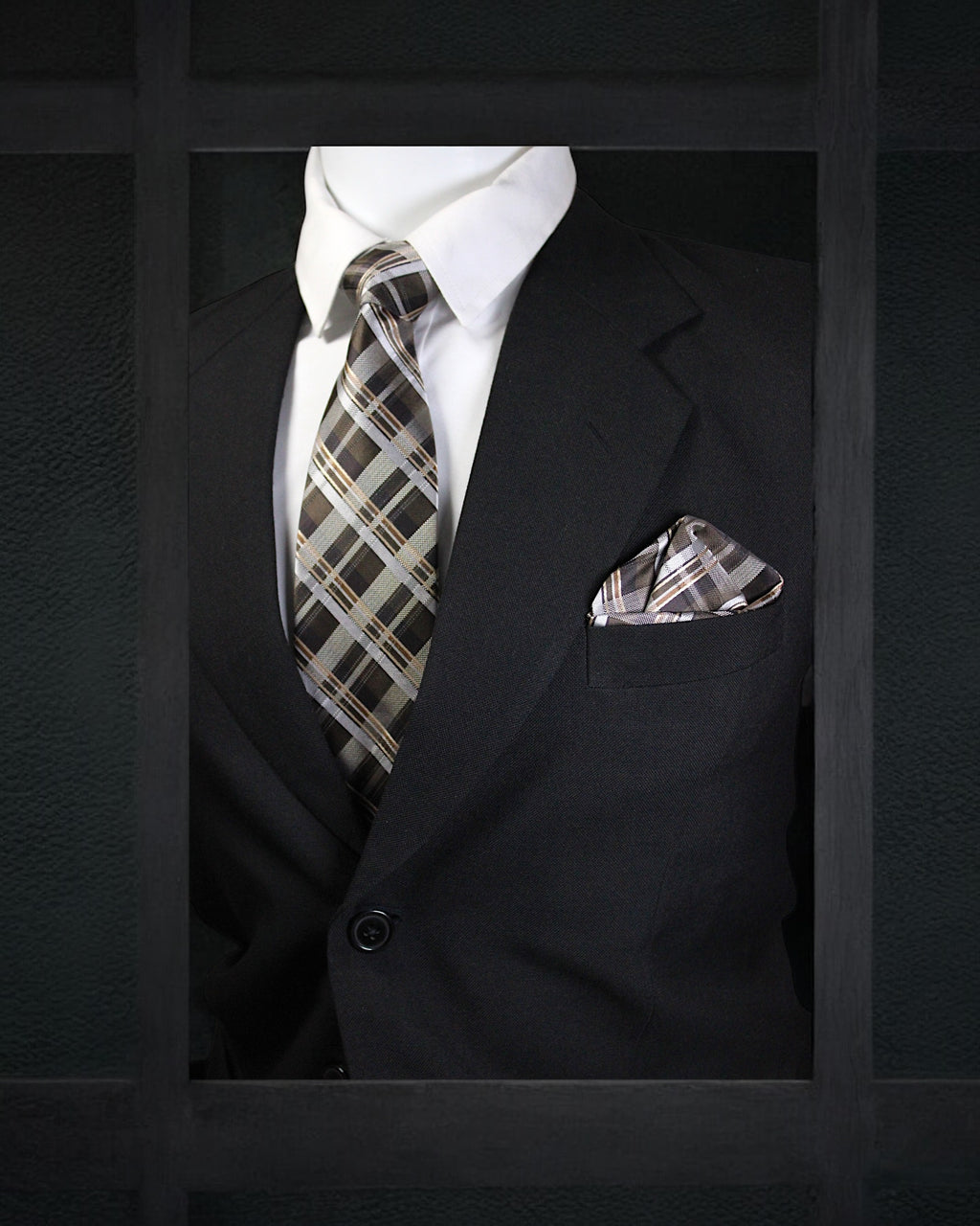 Black suit with plaid tie and pocket square on a dark background tie Benon