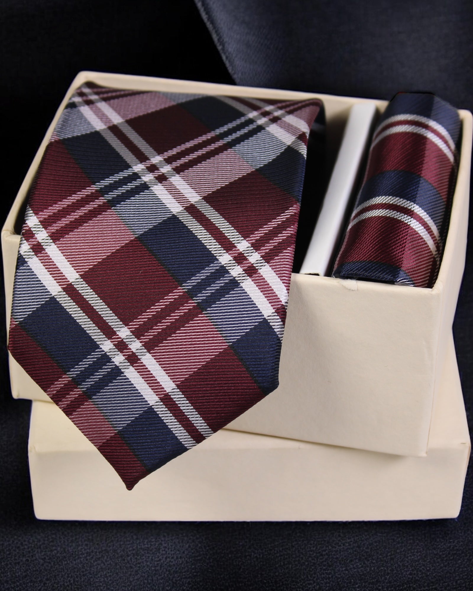 Plaid tie and pocket square set in a box on a dark background Tie Benon