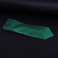 Green checkered tie on a black background