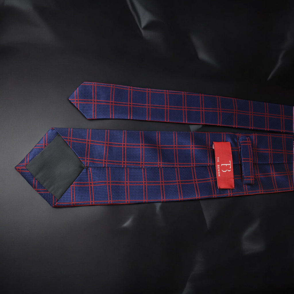 Blue and red checkered tie on a black background