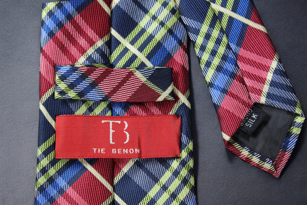 Plaid tie with a red label and 'Tie Benon' branding on a dark background