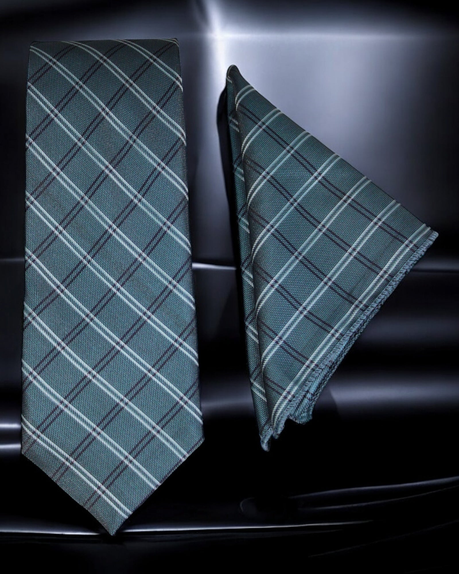 Green plaid tie and matching pocket square on a dark background Tie Benon