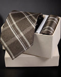 Brown plaid tie and pocket square set in a white box on a dark background Tie Benon