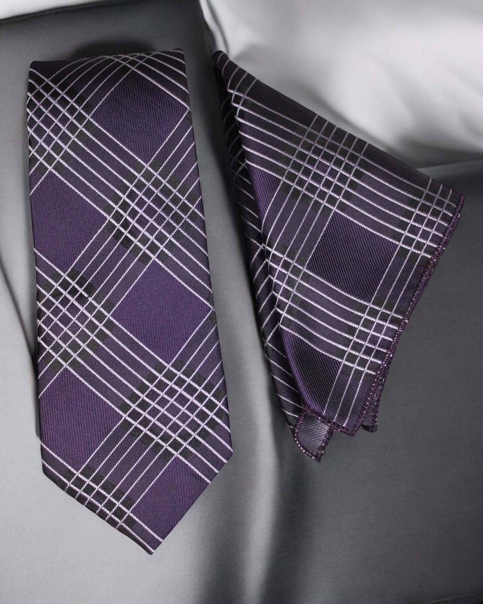 Purple plaid tie and pocket square on a gray background Tie Benon