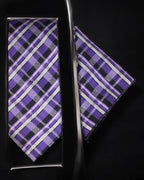 Purple and black plaid tie and pocket square set on a dark background Tie Benon