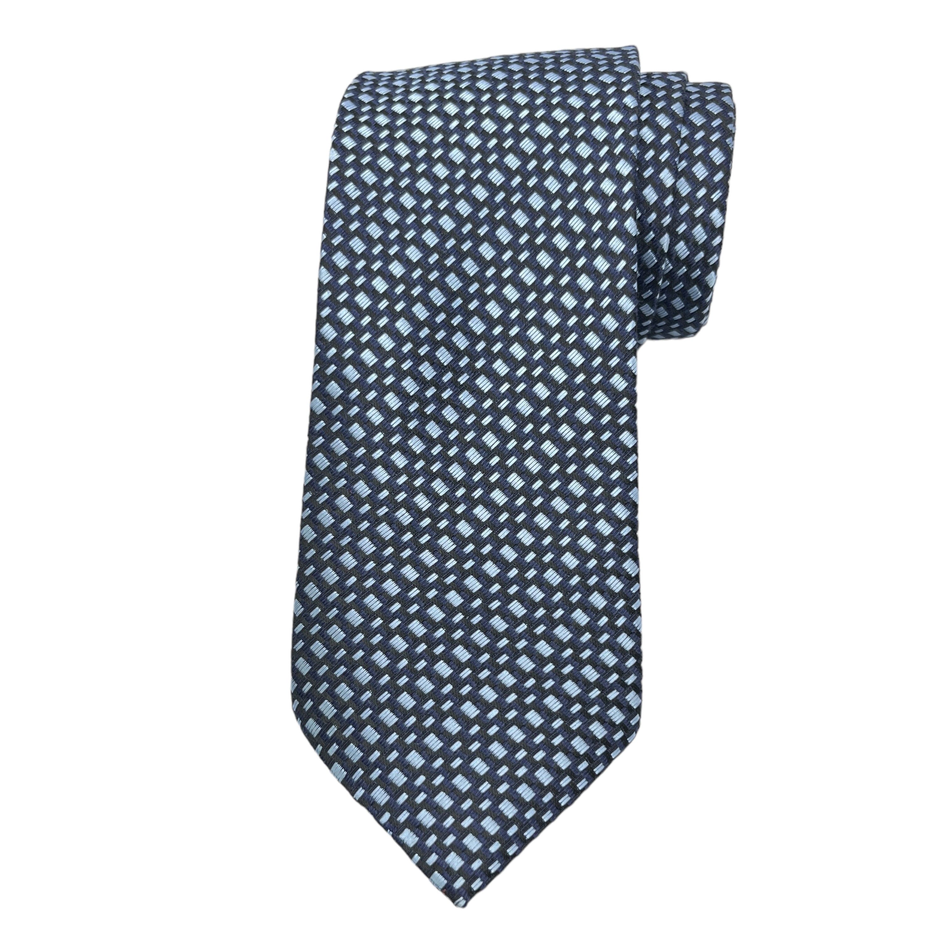 A necktie with a geometric pattern featuring shades of blue and gray.