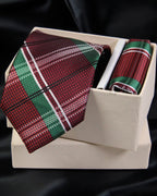 Red and green plaid tie and pocket square set in a box on a black background Tie Benon