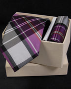 Plaid tie and pocket square set in a box on a black background Tie Benon