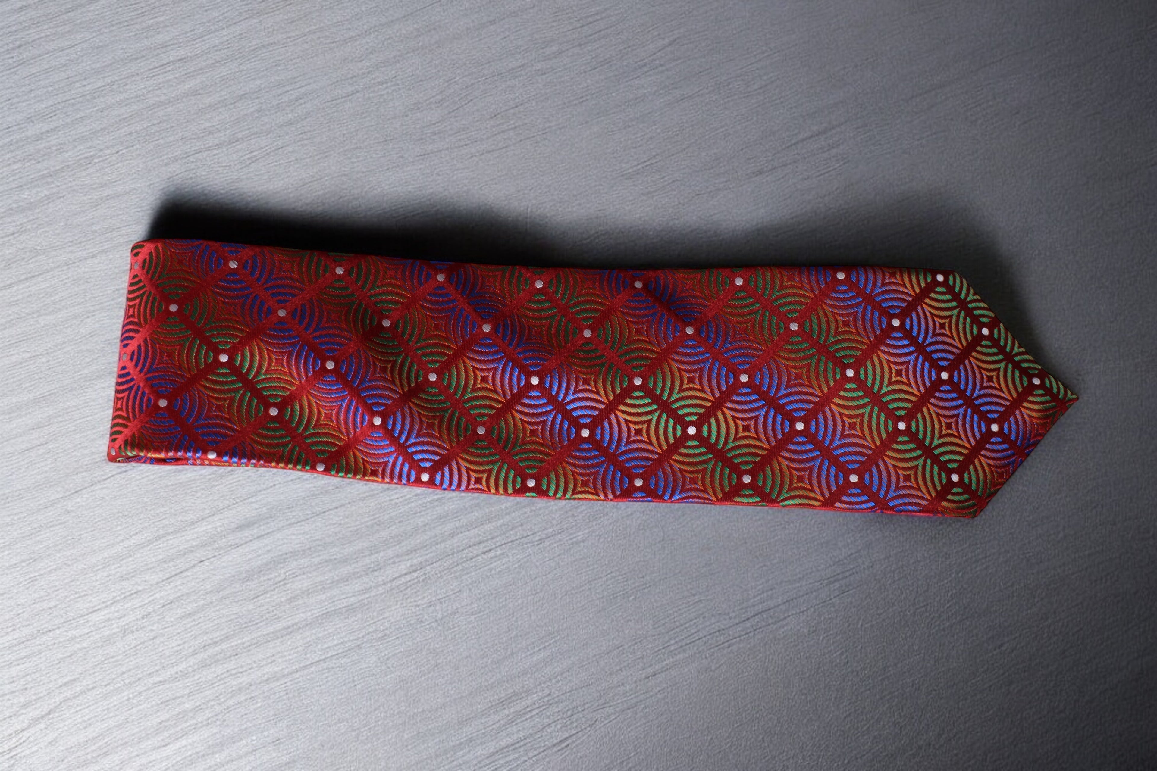 Luxurious Red Microsilk Tie with Vibrant Geometric Pattern