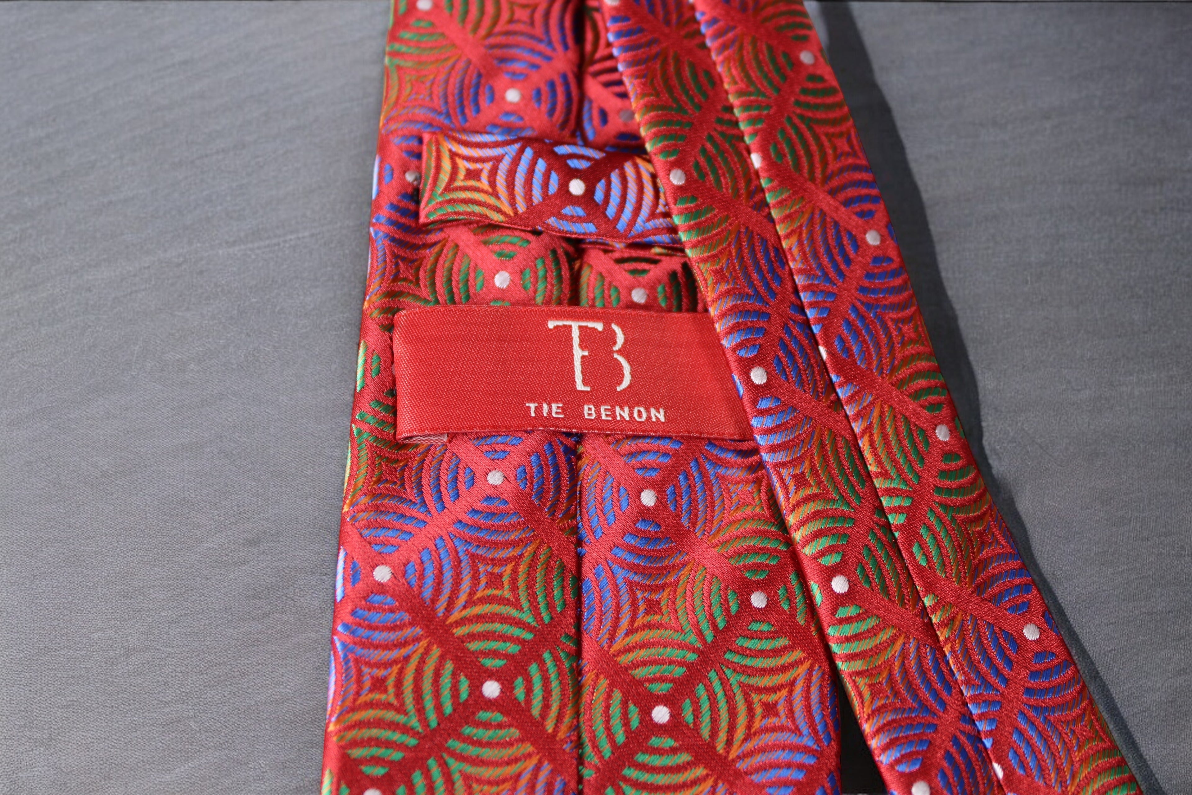 Luxurious Red Microsilk Tie with Vibrant Geometric Pattern