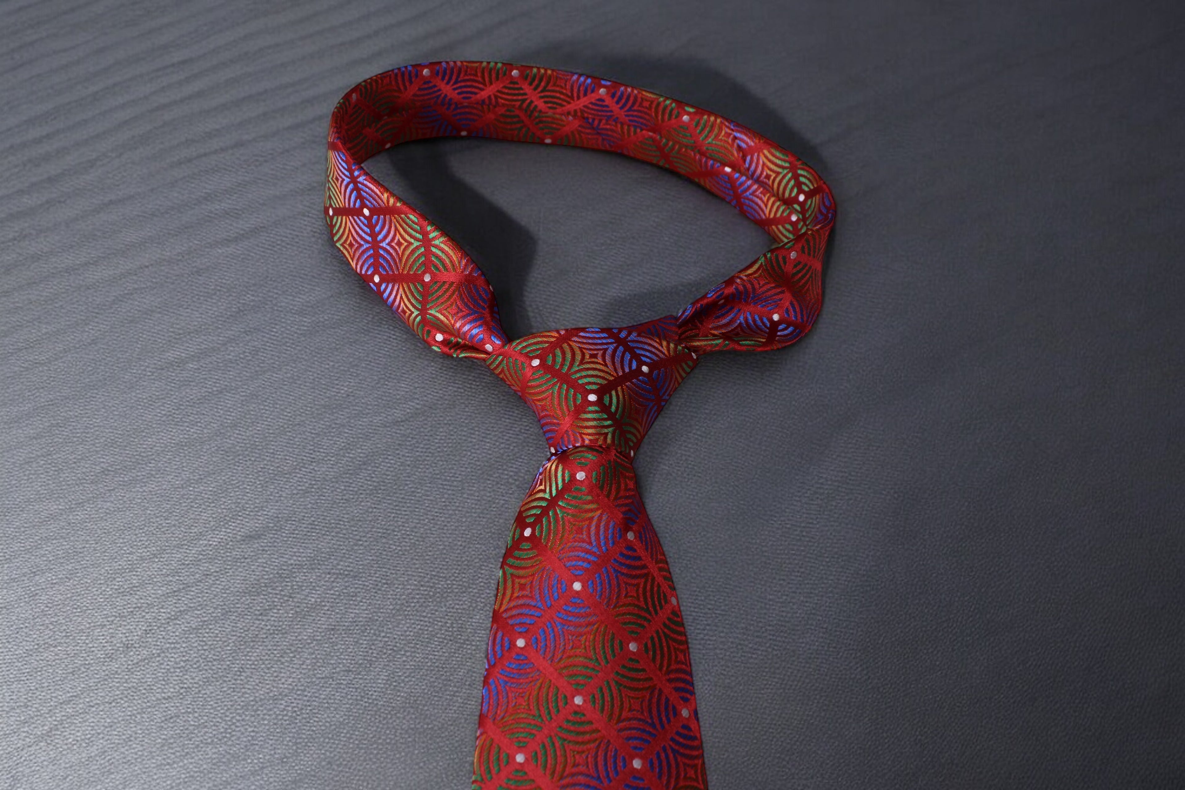 Luxurious Red Microsilk Tie with Vibrant Geometric Pattern