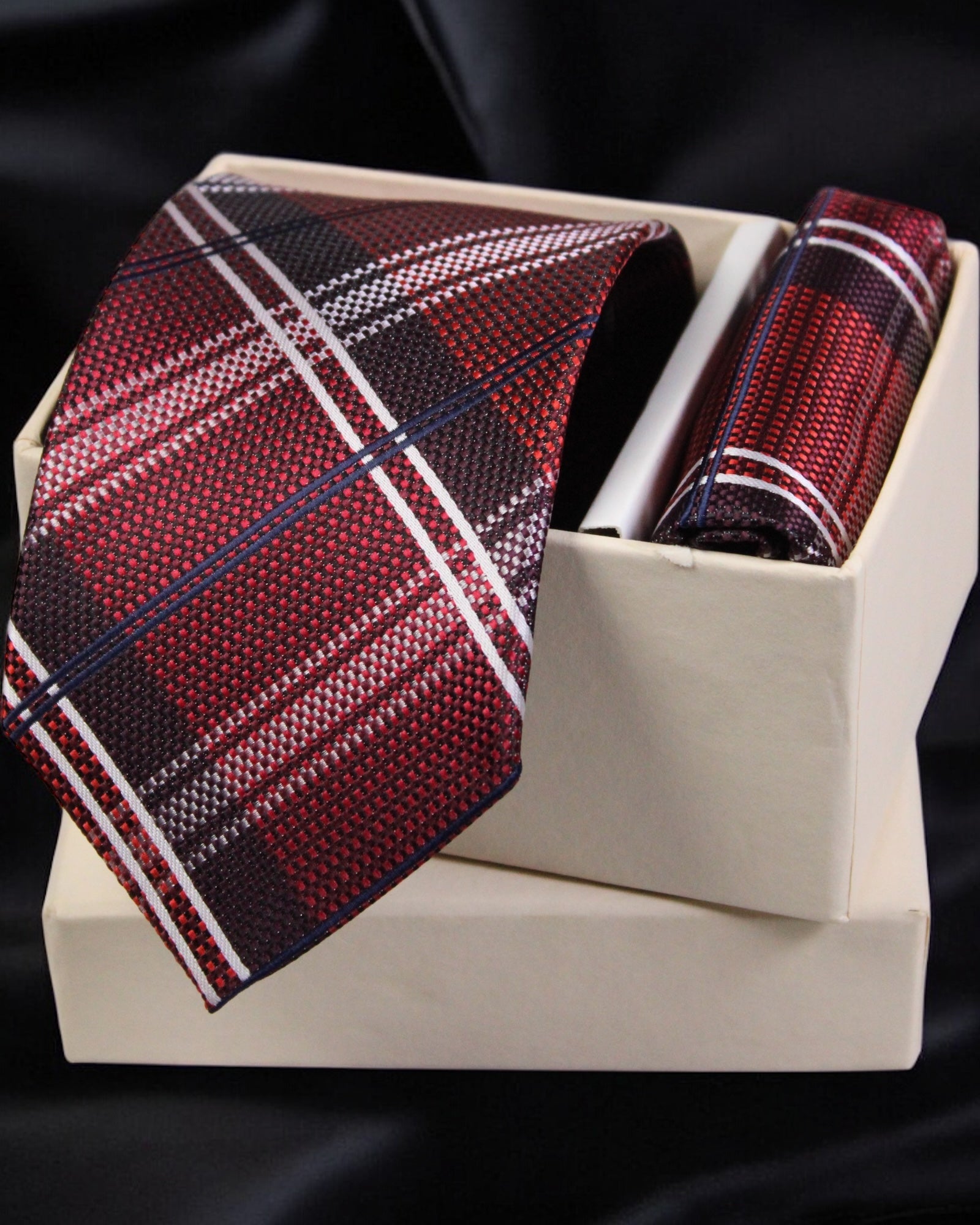 Plaid tie and pocket square set in a box on a dark background Tie Benon