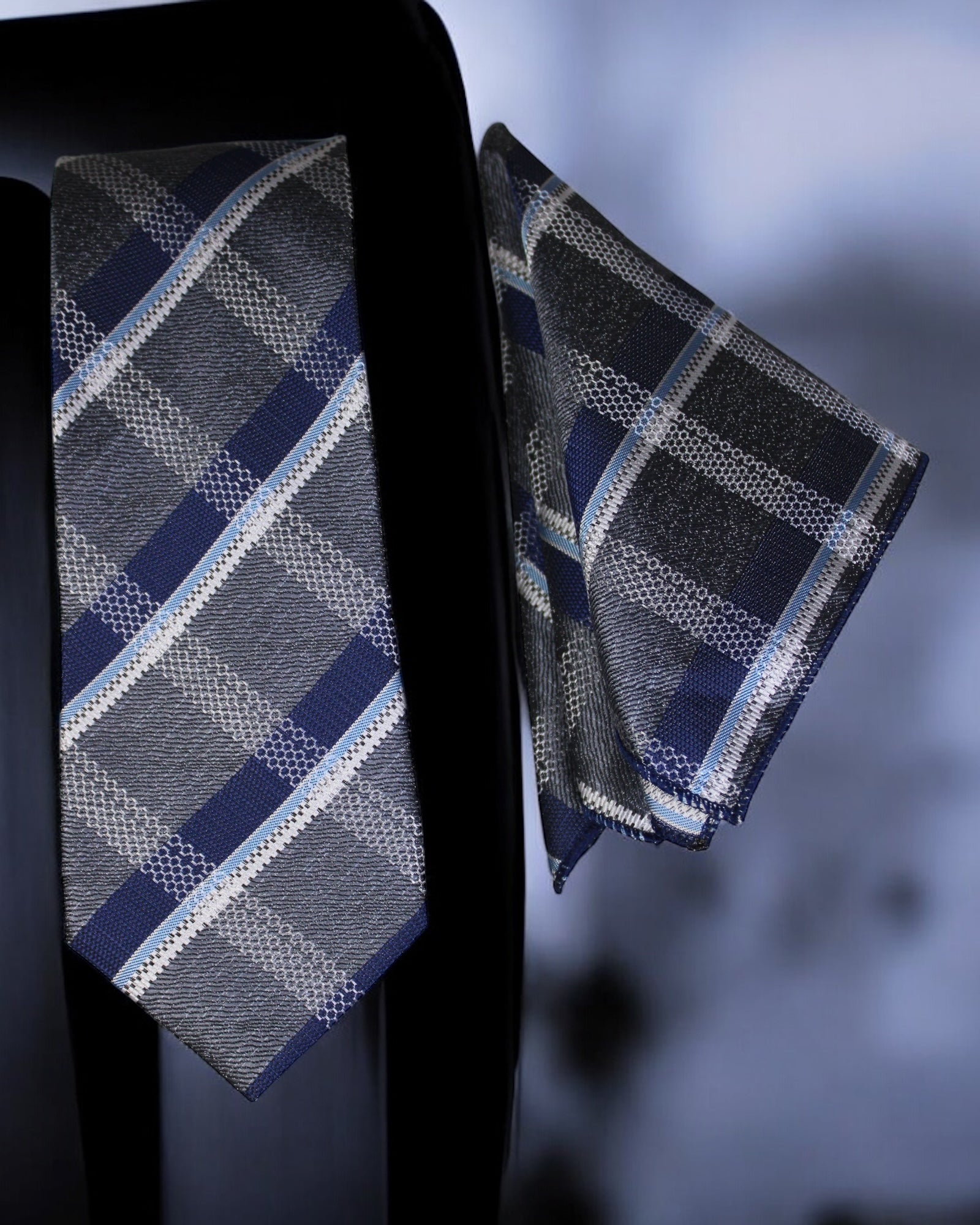 Plaid tie and pocket square set on a dark background Tie Benon