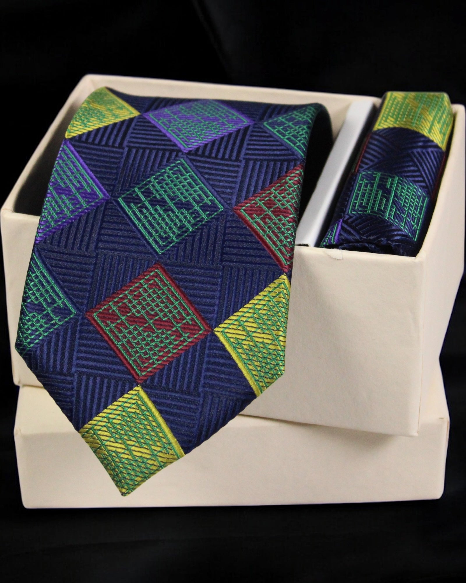 Colorful geometric patterned tie and pocket square set in a white box Tie Benon