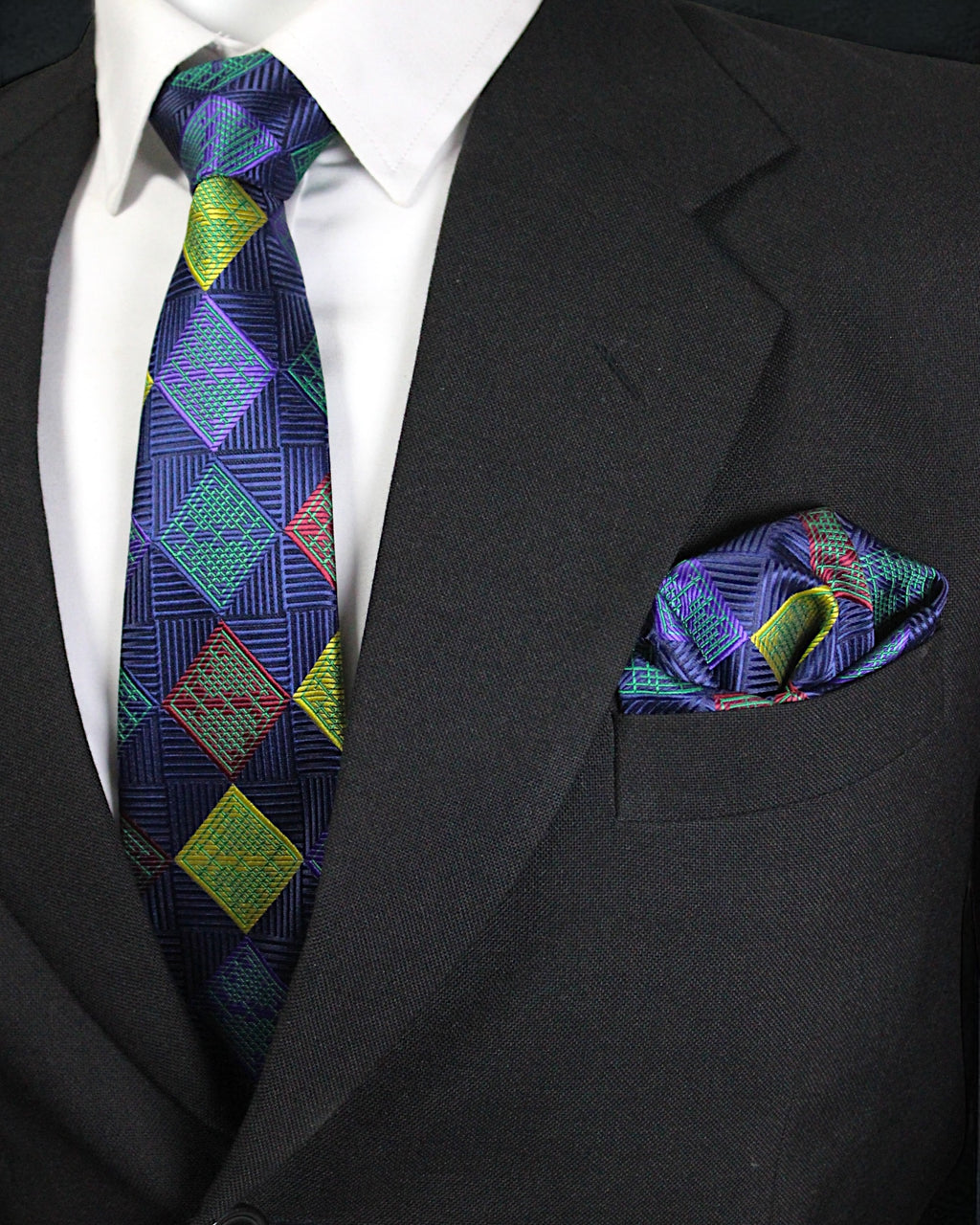 Black suit with a colorful tie and pocket square Tie Benon