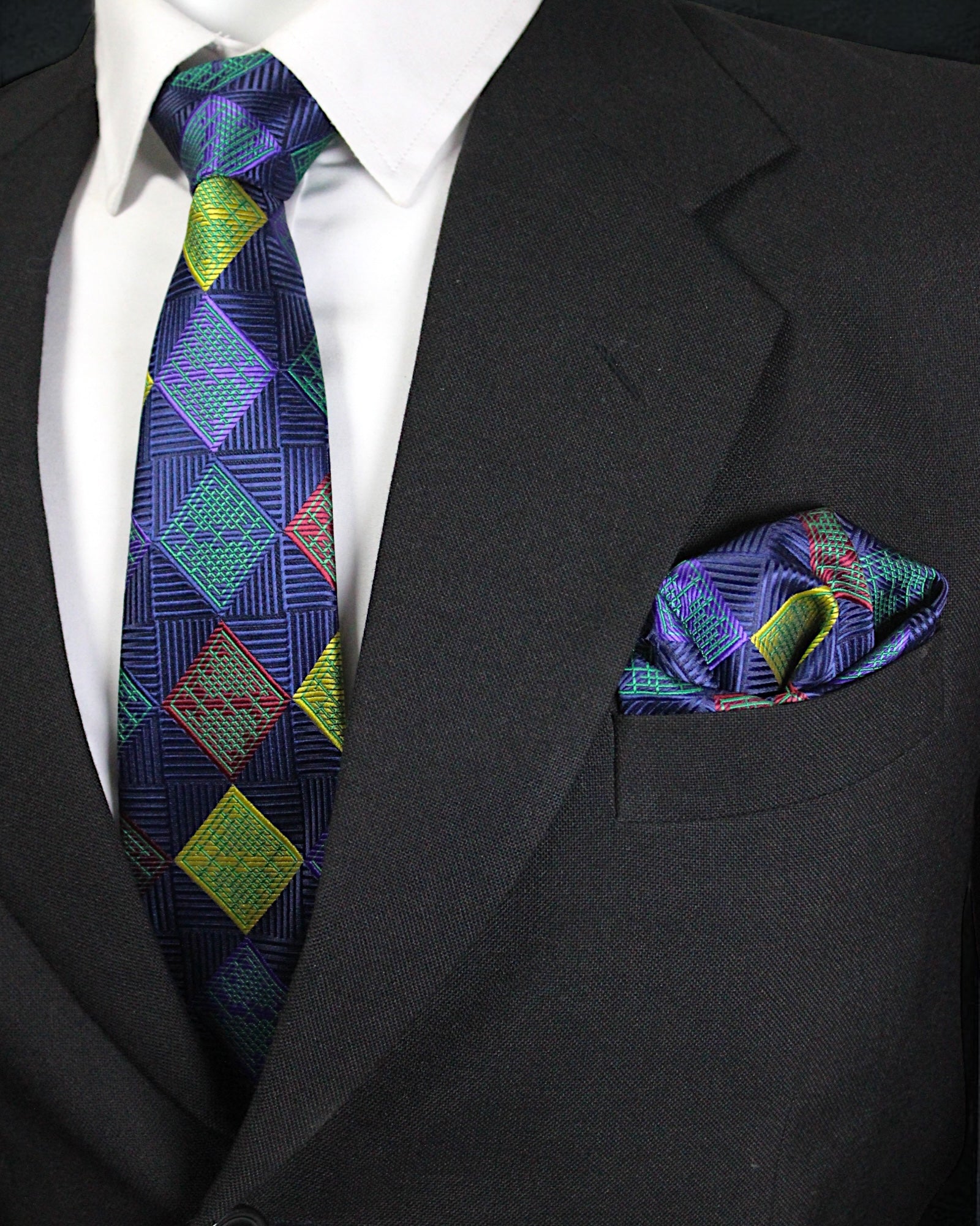 Black suit with a colorful tie and pocket square Tie Benon