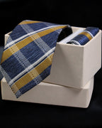 Striped tie with a pocket square in a white box on a black background Tie Benon