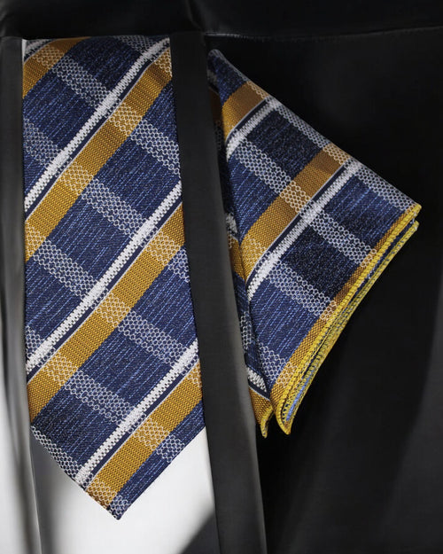 Blue and yellow striped tie with matching pocket square on a black background Tie Benon