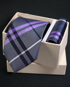 Plaid tie and pocket square set in a box on a black background Tie Benon