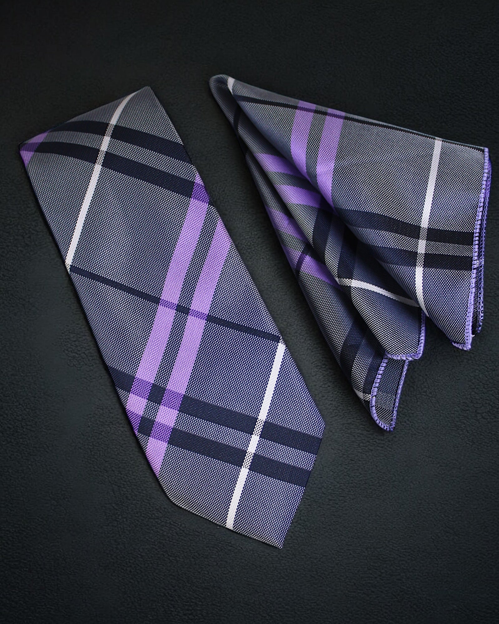 Plaid tie and pocket square set on a black background Tie Benon