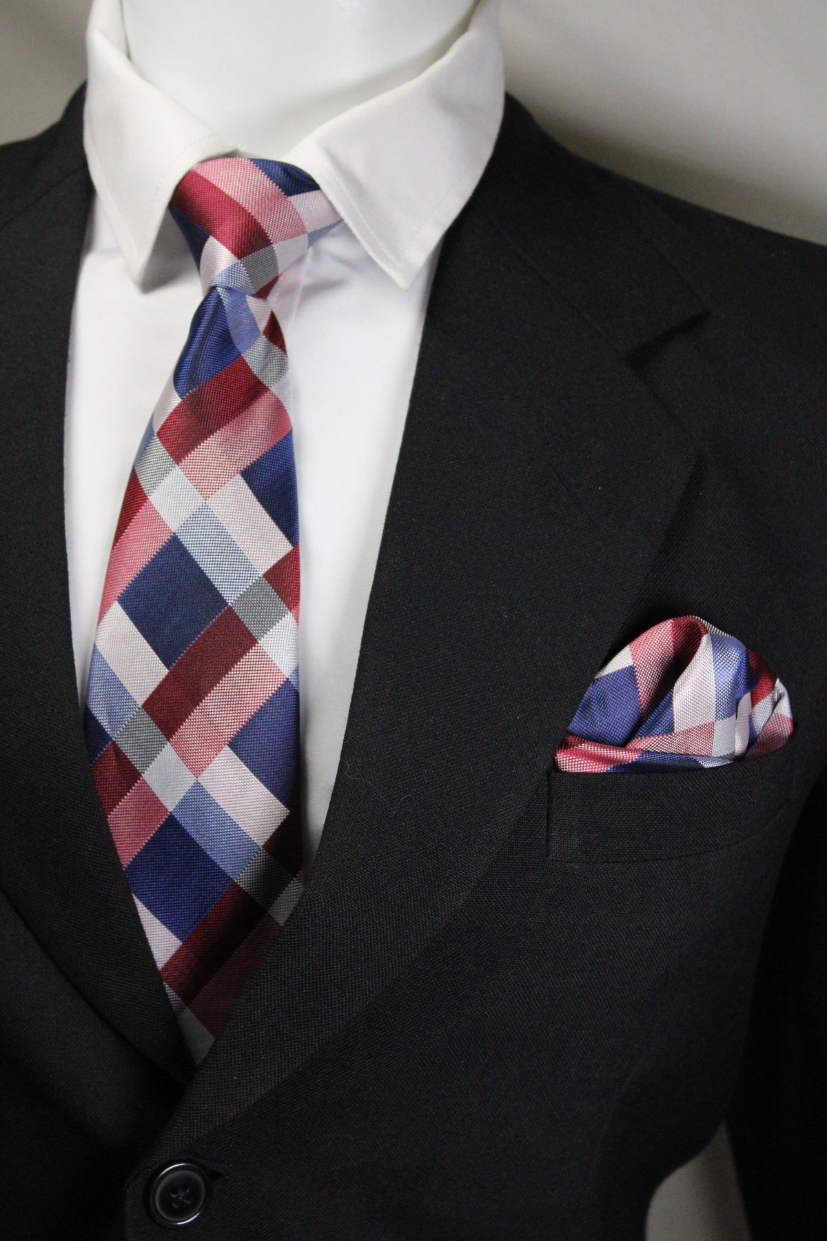 Plaid tie on a white shirt with a black suit jacket Tie Benon
