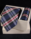 Plaid tie and pocket square set in a white box on a black background Tie Benon