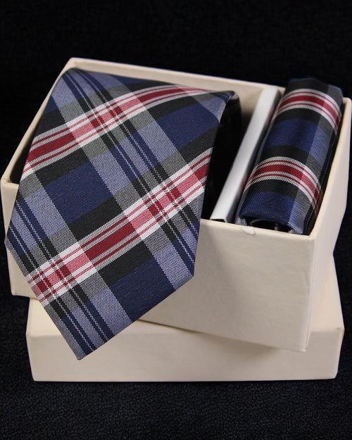 Plaid tie and pocket square set in a white box on a black background Tie Benon