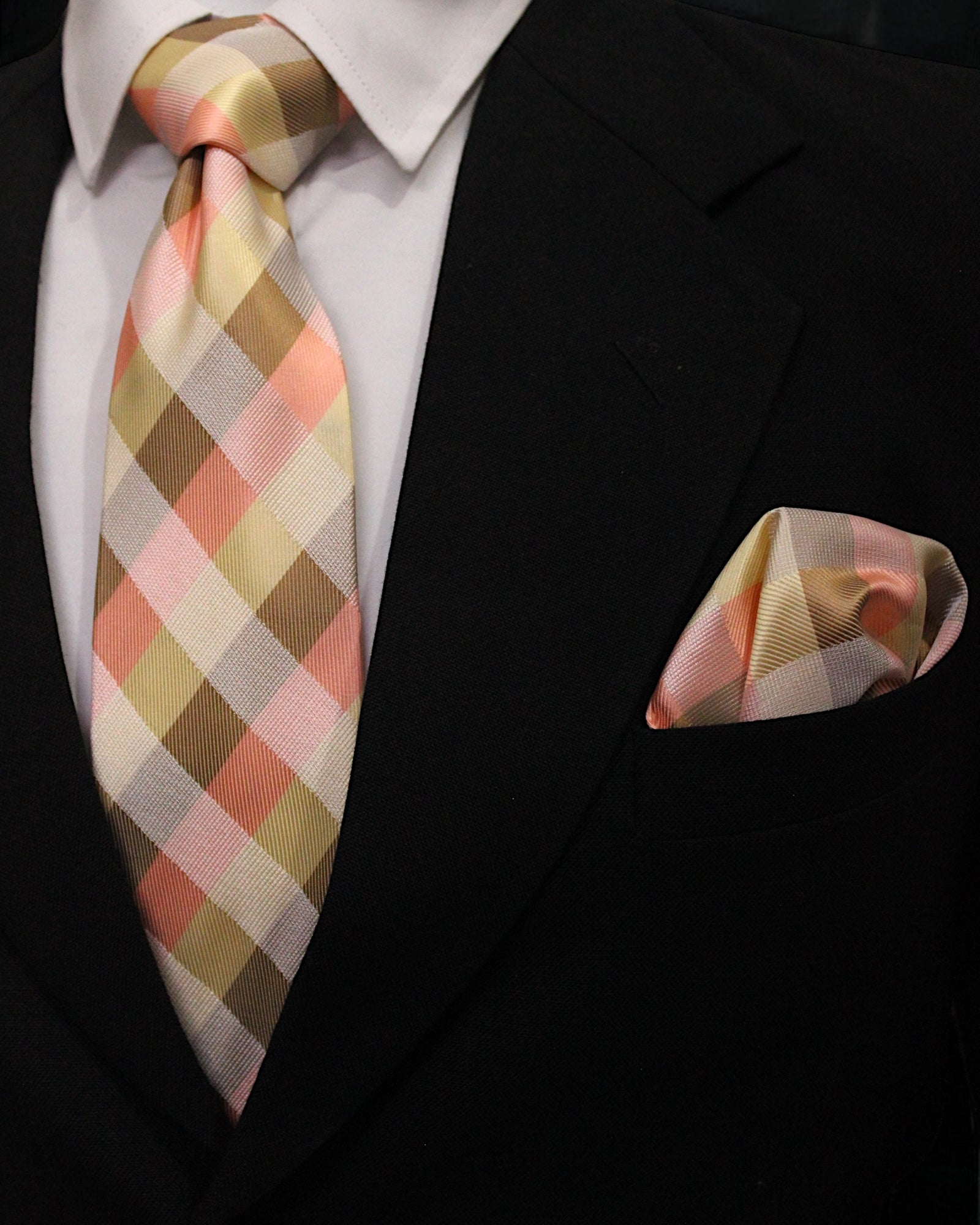 Checkered tie and pocket square set on a black suit jacket Tie Benon