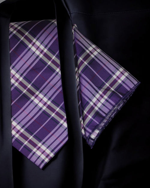 Purple plaid tie and pocket square set on a black shirt tie benon