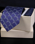 Blue checkered tie in a white box with a black background tie benon