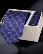Blue checkered tie in a white box on a dark background Tie Benon