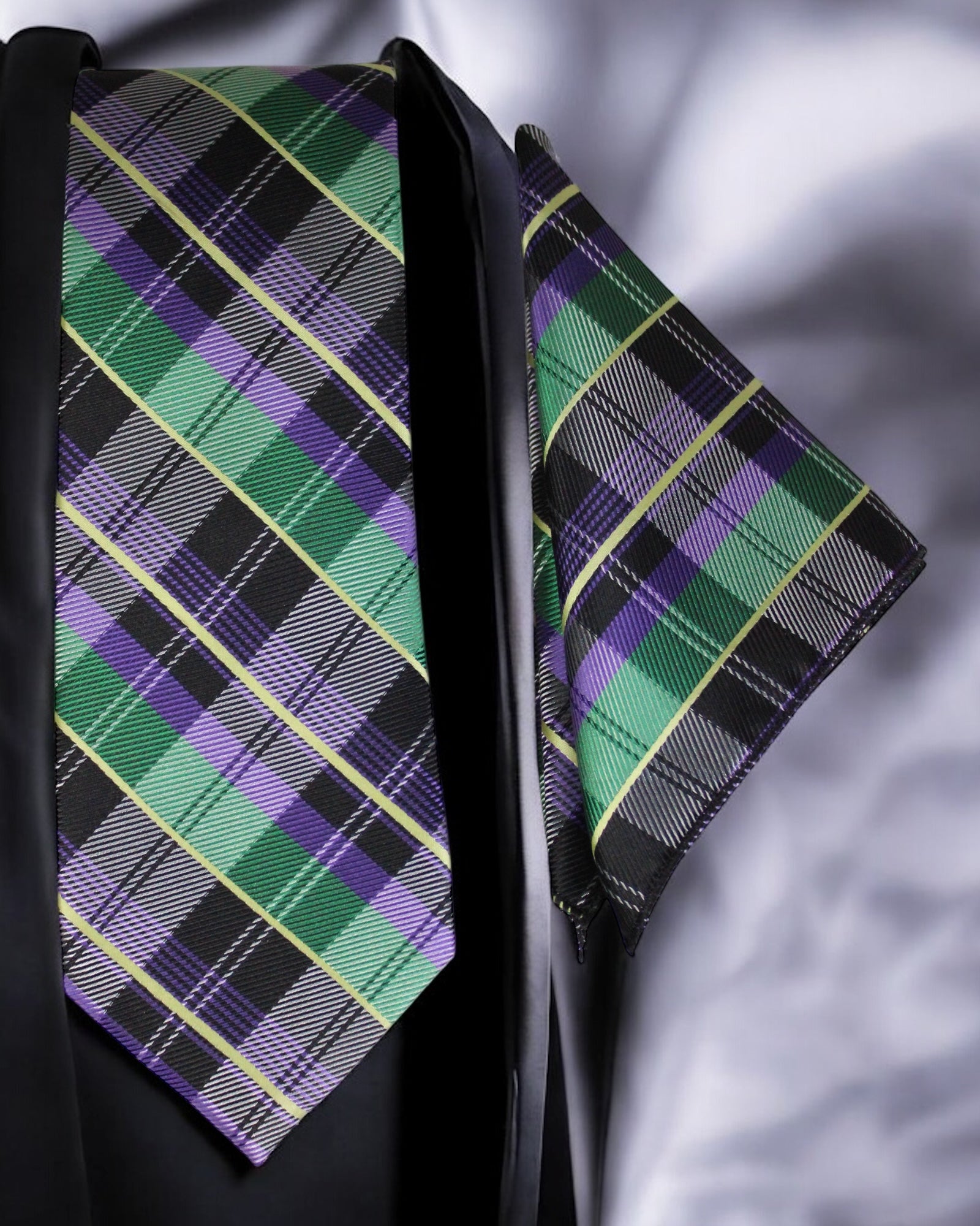Plaid tie and pocket square with green, purple, and black pattern on a gray background Tie Benon