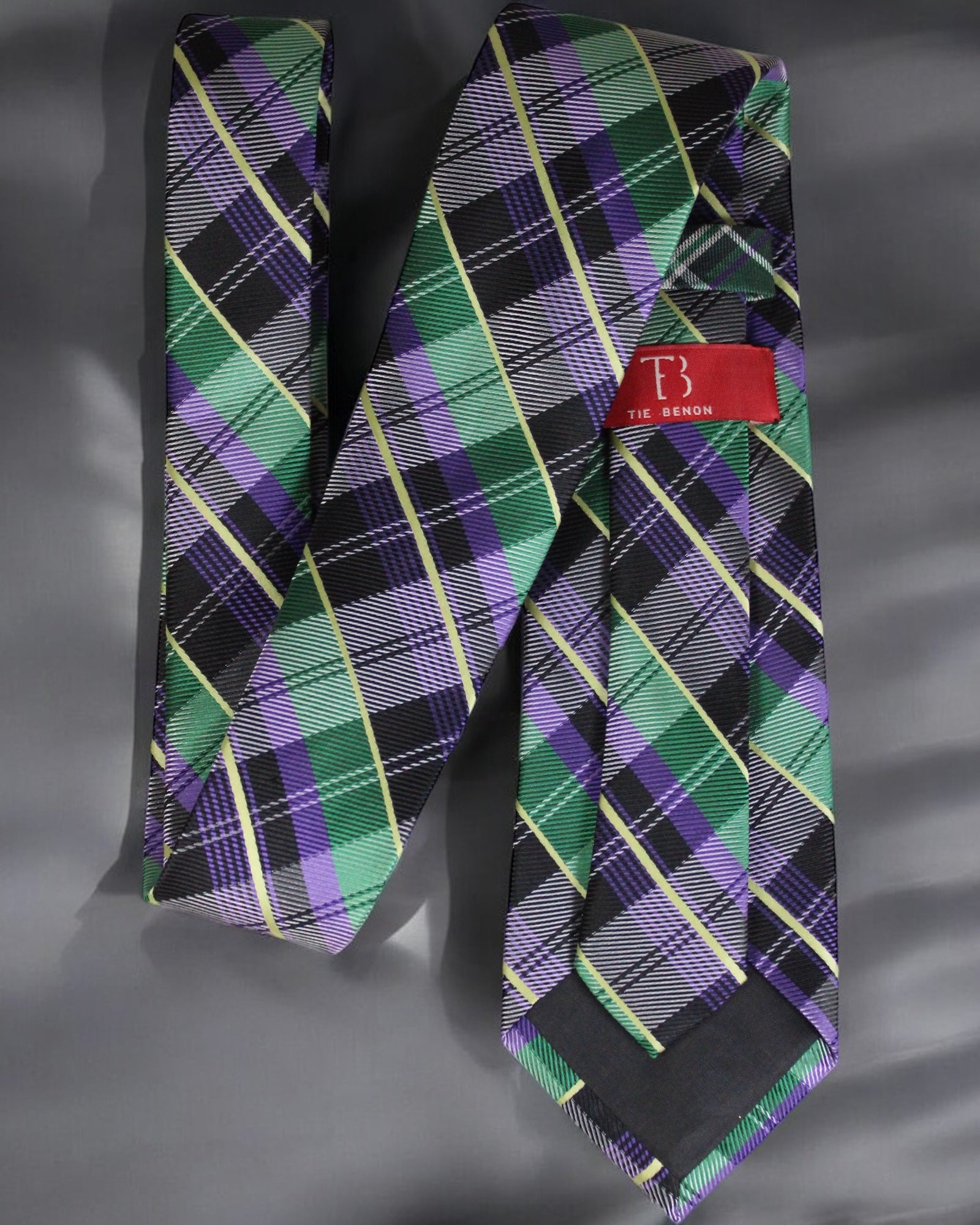 Plaid tie with a red label on a gray background Tie Benon