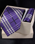Purple plaid tie and matching pocket square in a white box on a black background Tie Benon