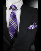 Black suit with a white shirt, purple plaid tie, and matching pocket square Tie Benon