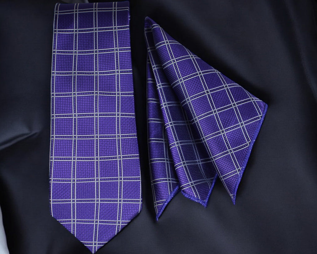 Purple checkered tie and pocket square on a black fabric background Tie Benon