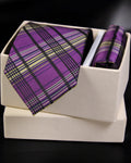 Purple plaid tie and matching pocket square in a white box on a black background