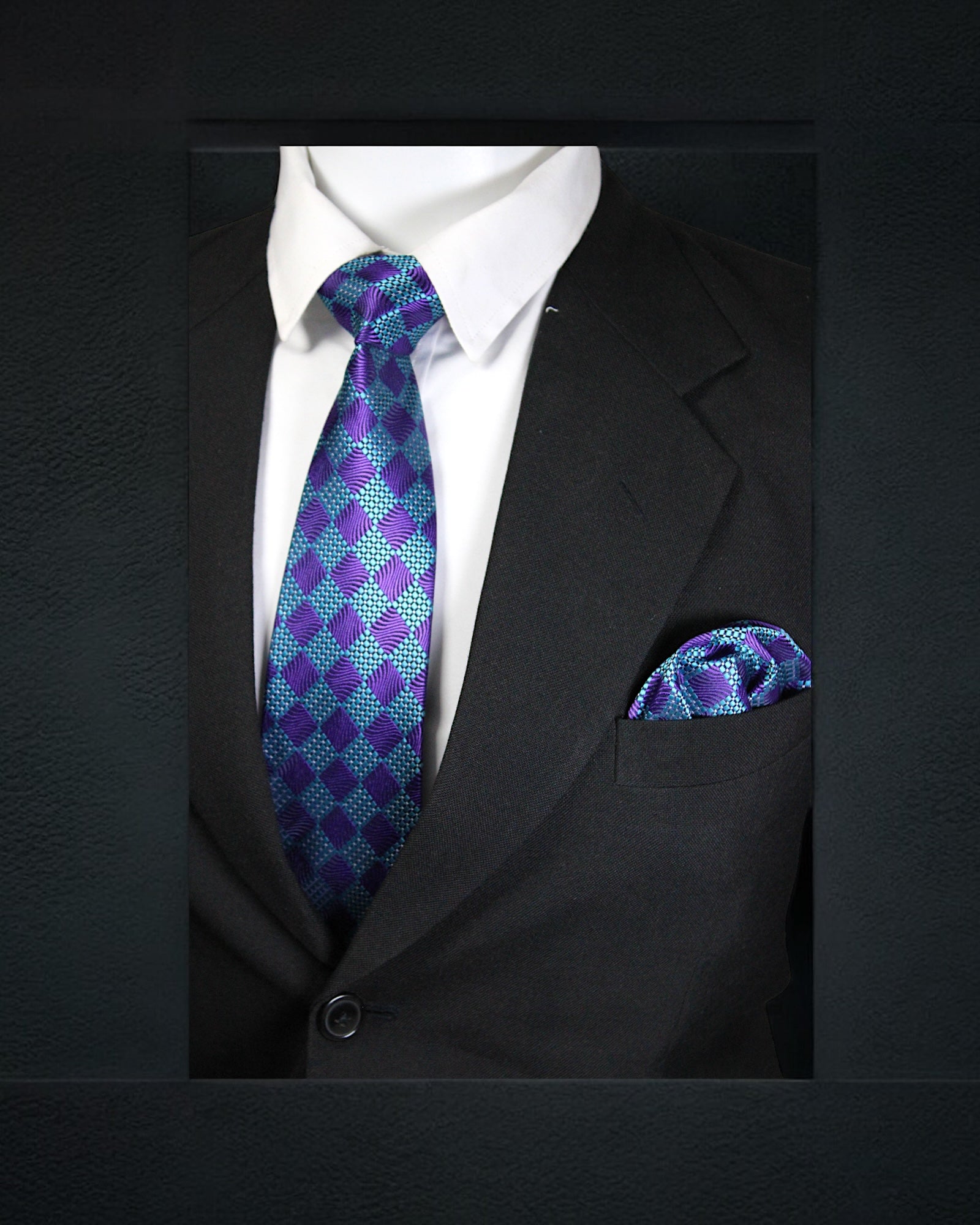 Black suit with a white shirt, purple patterned tie, and matching pocket square on a dark background Tie Benon