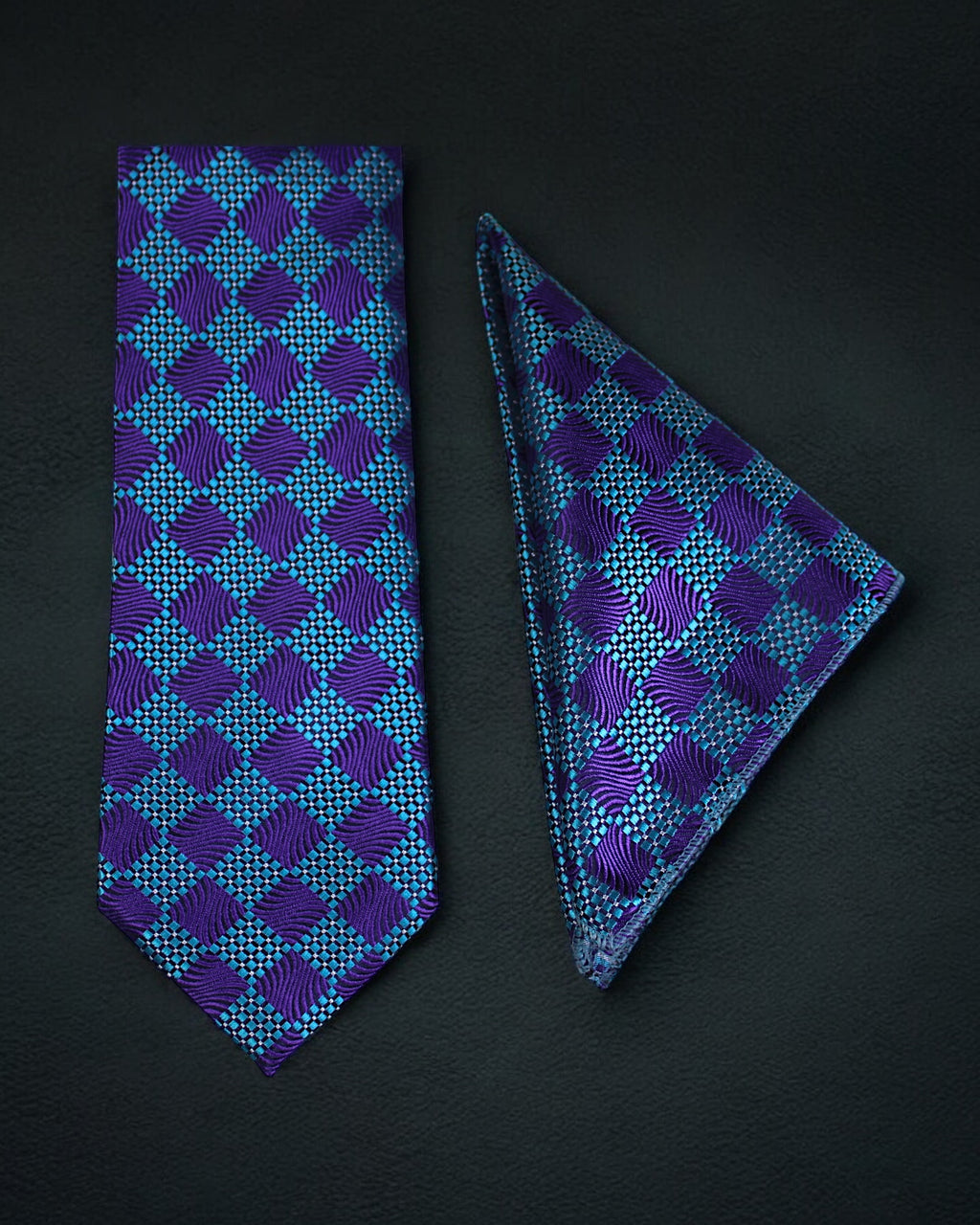 Blue and purple patterned tie and pocket square on a black background Tie Benon