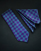 Blue and purple checkered tie on a black background