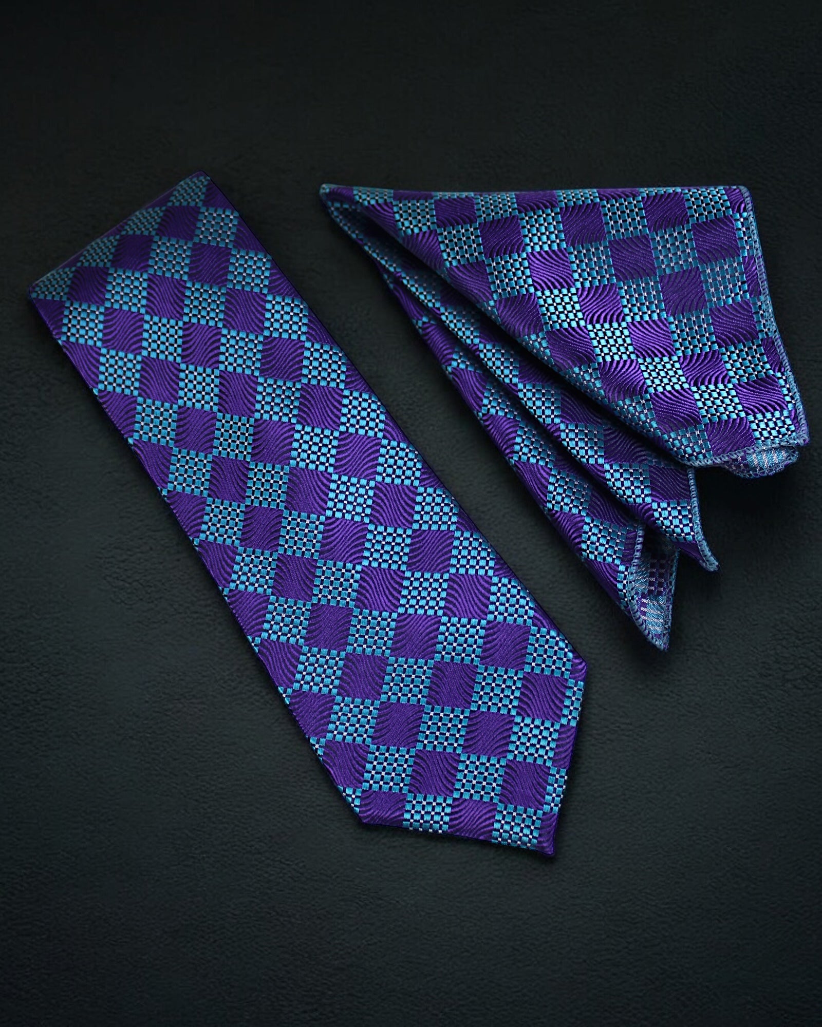 Blue and purple checkered tie on a black background