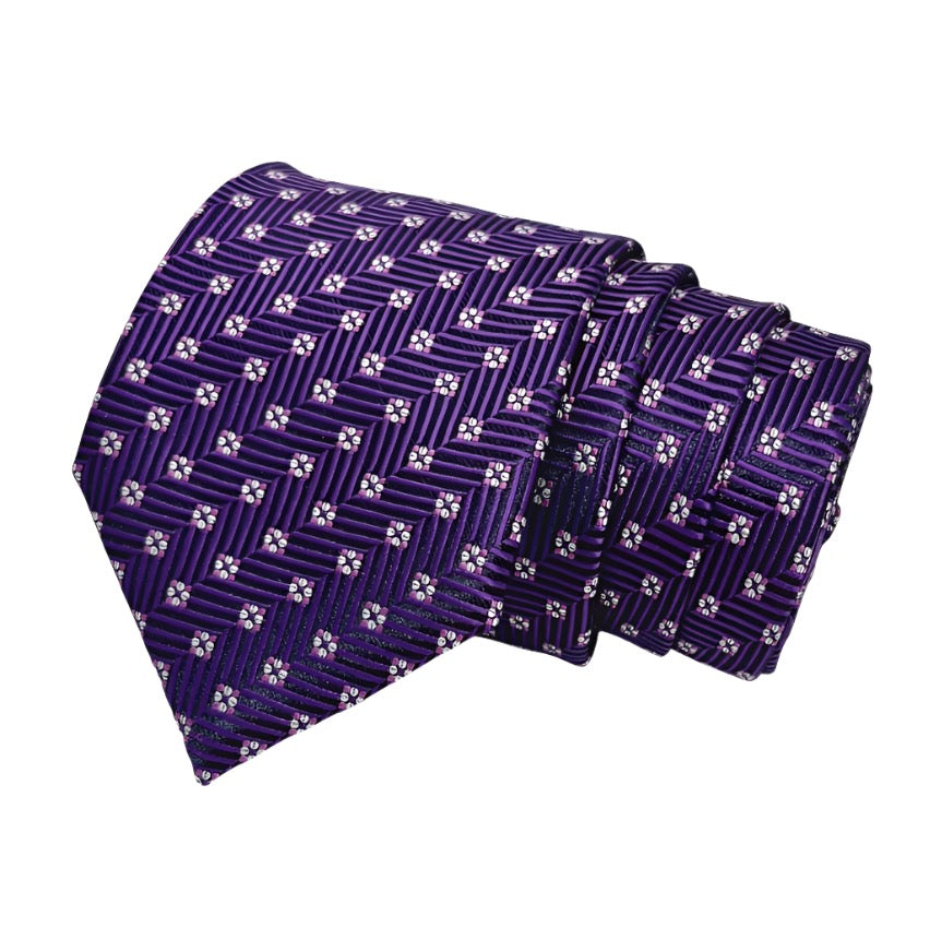 A set of purple microsilk neckties with a geometric pattern, displayed in a folded arrangement.