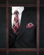 Black suit with plaid tie and pocket square on a dark background Tie Benon
