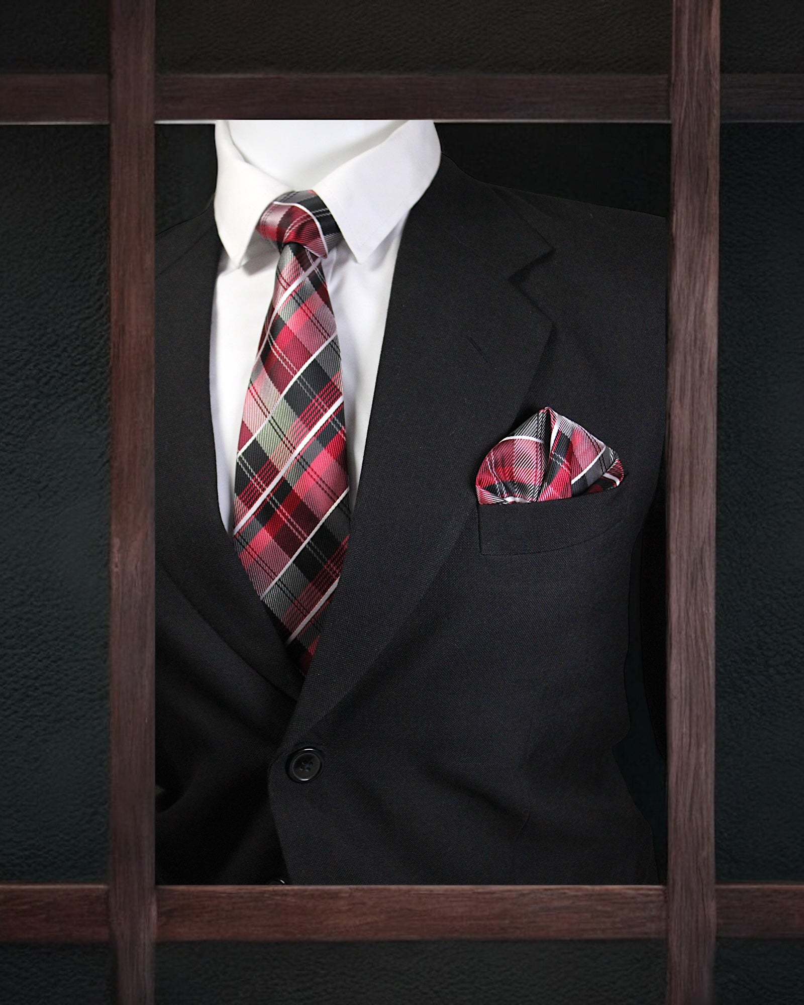 Black suit with plaid tie and pocket square on a dark background Tie Benon
