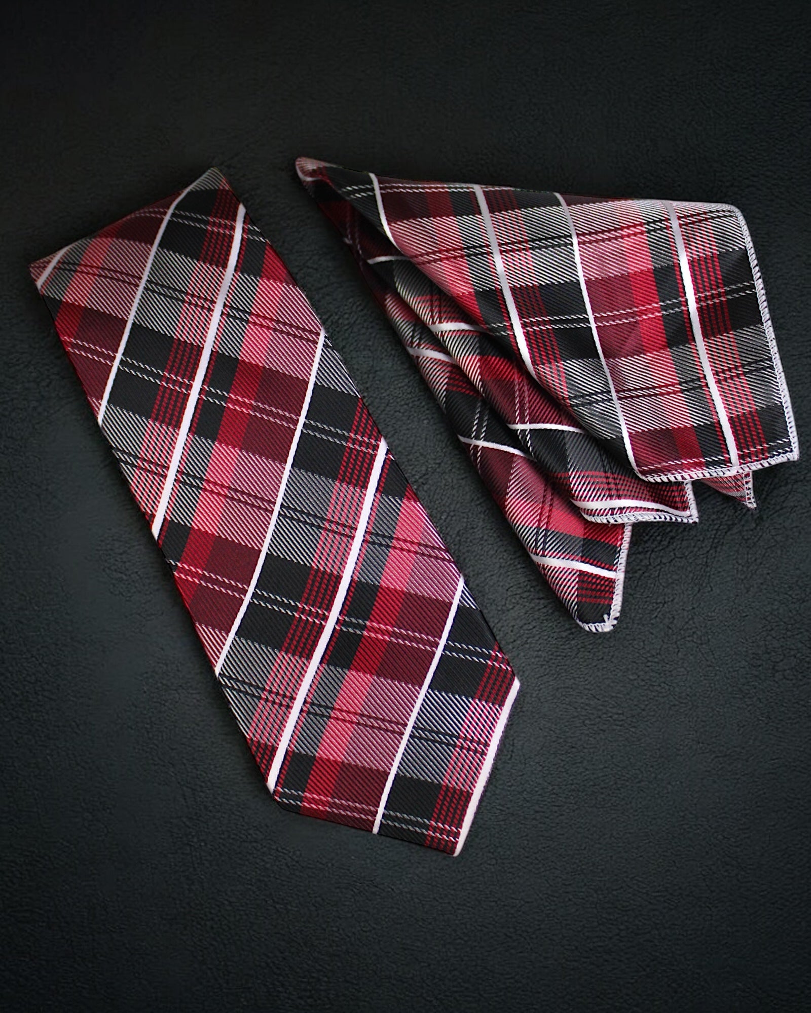 Plaid tie and pocket square set on a black background Tie Benon