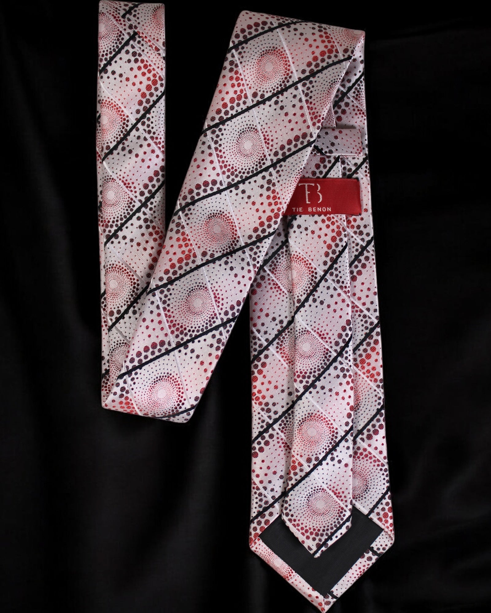 Patterned tie with a brand label on a black background Tie Benon